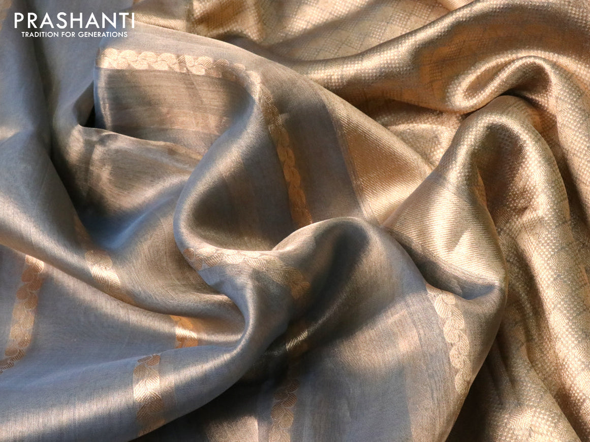 Banarasi tissue silk saree pastel blue with allover zari weaves and zari woven butta border