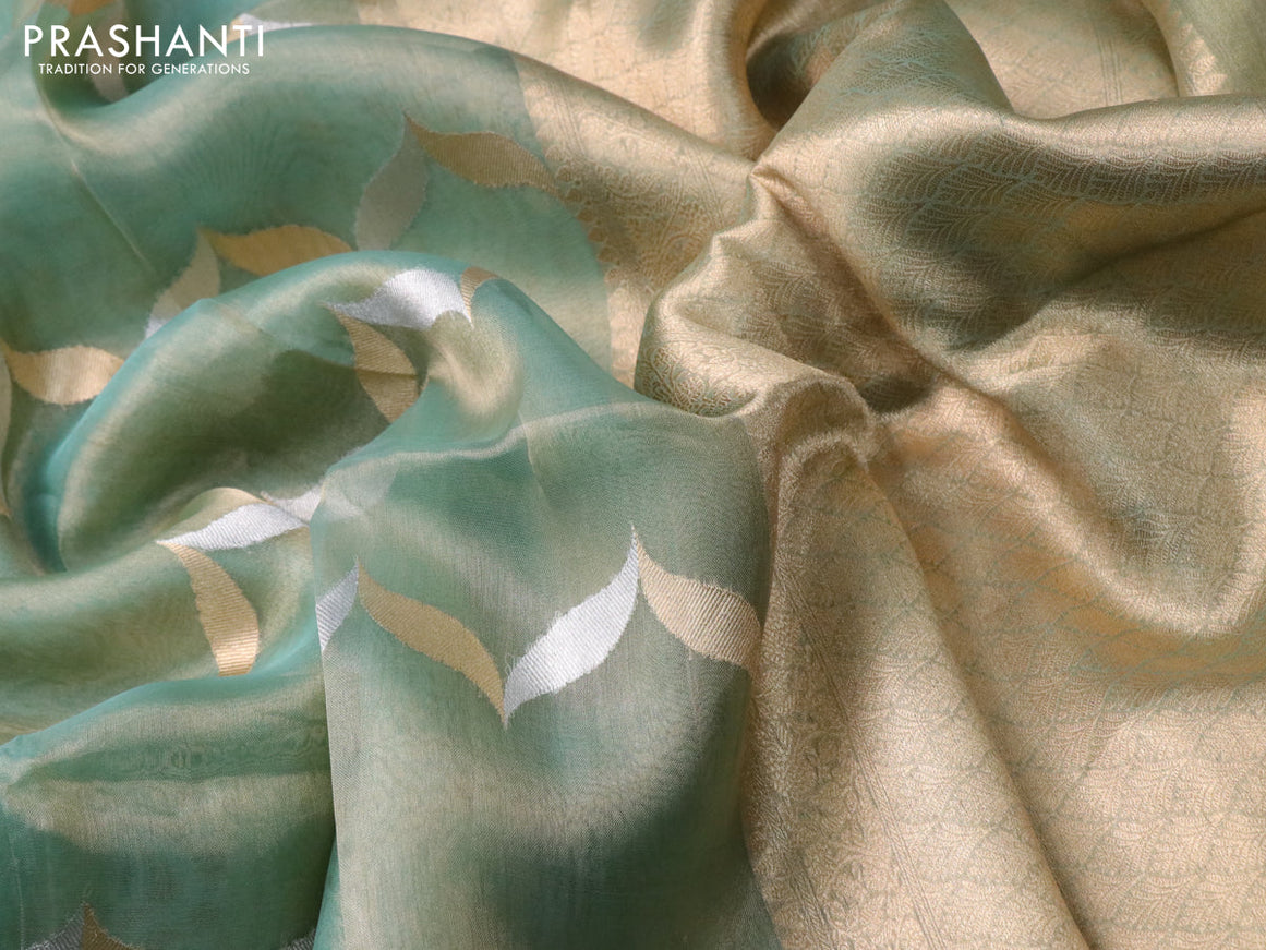 Banarasi tissue silk saree teal green shade with silver & gold zari weaves in borderless style