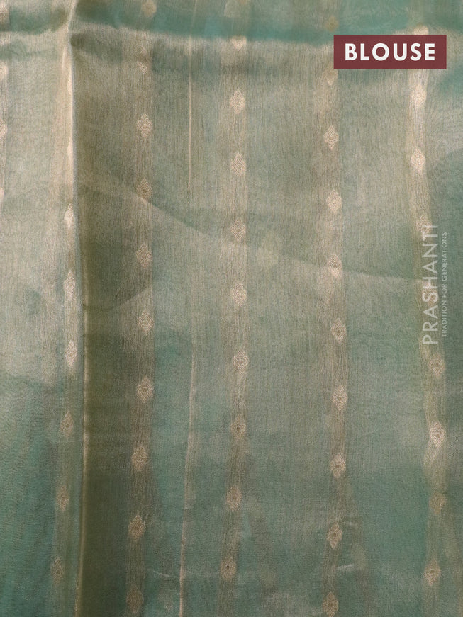 Banarasi tissue silk saree teal green shade with silver & gold zari weaves in borderless style