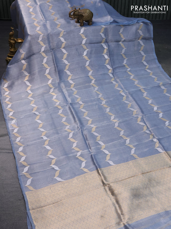 Banarasi tissue silk saree pastel blue shade with silver & gold zari weaves in borderless style