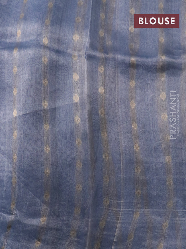 Banarasi tissue silk saree pastel blue shade with silver & gold zari weaves in borderless style