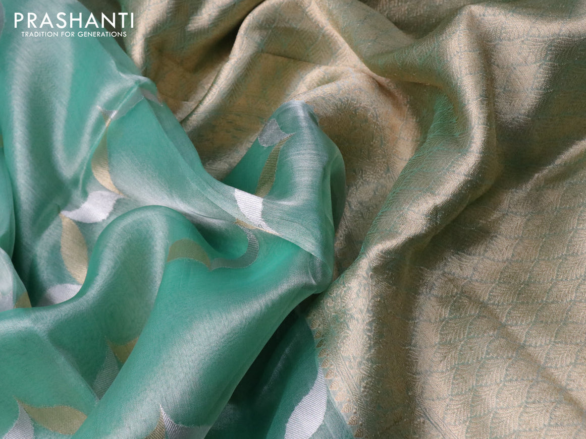 Banarasi tissue silk saree teal green shade with silver & gold zari weaves in borderless style