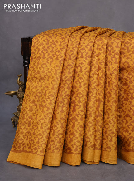 Pure tussar silk saree mustard yellow and brown with allover prints and simple border