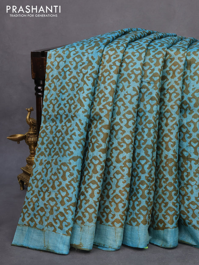 Pure tussar silk saree light blue and sap green with allover prints and simple border