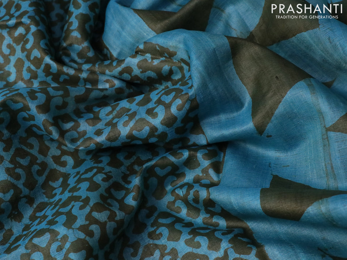 Pure tussar silk saree light blue and sap green with allover prints and simple border