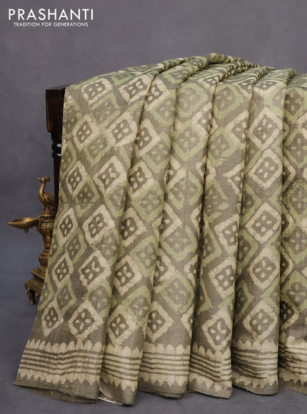 Pure tussar silk saree military green with allover batik prints and printed border