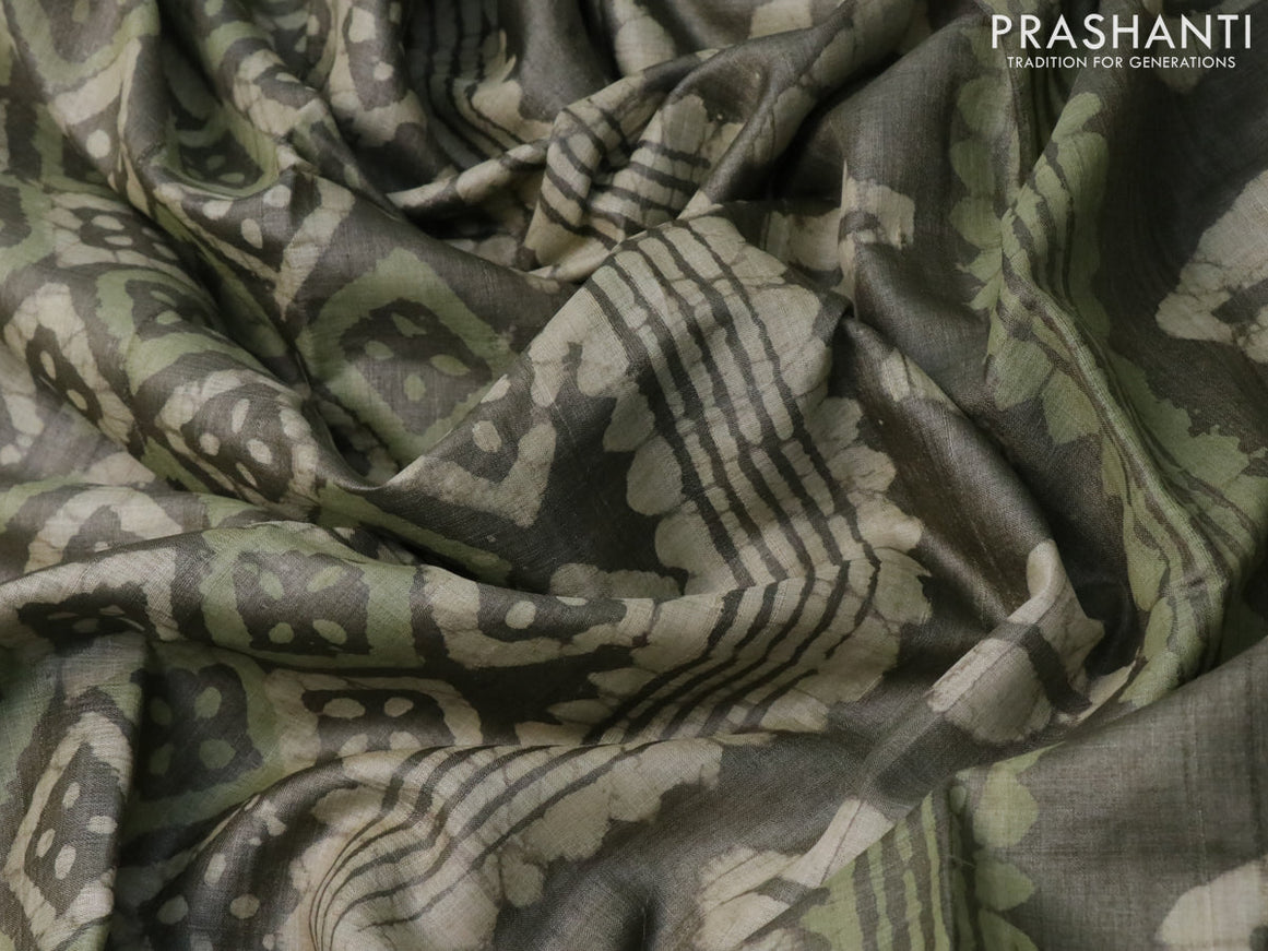 Pure tussar silk saree military green with allover batik prints and printed border