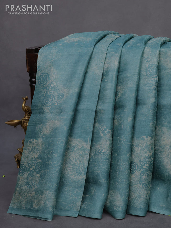 Pure tussar silk saree teal blue shade with floral prints in borderless style