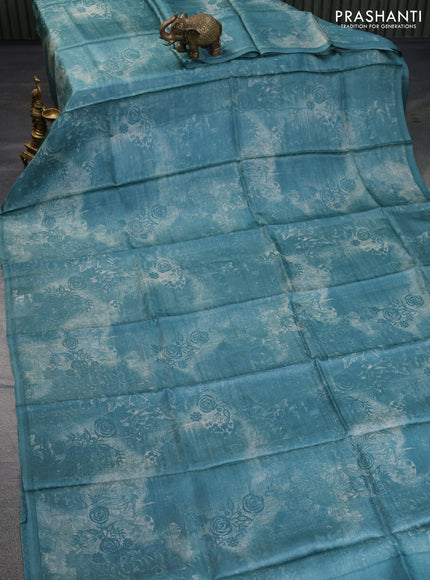 Pure tussar silk saree teal blue shade with floral prints in borderless style