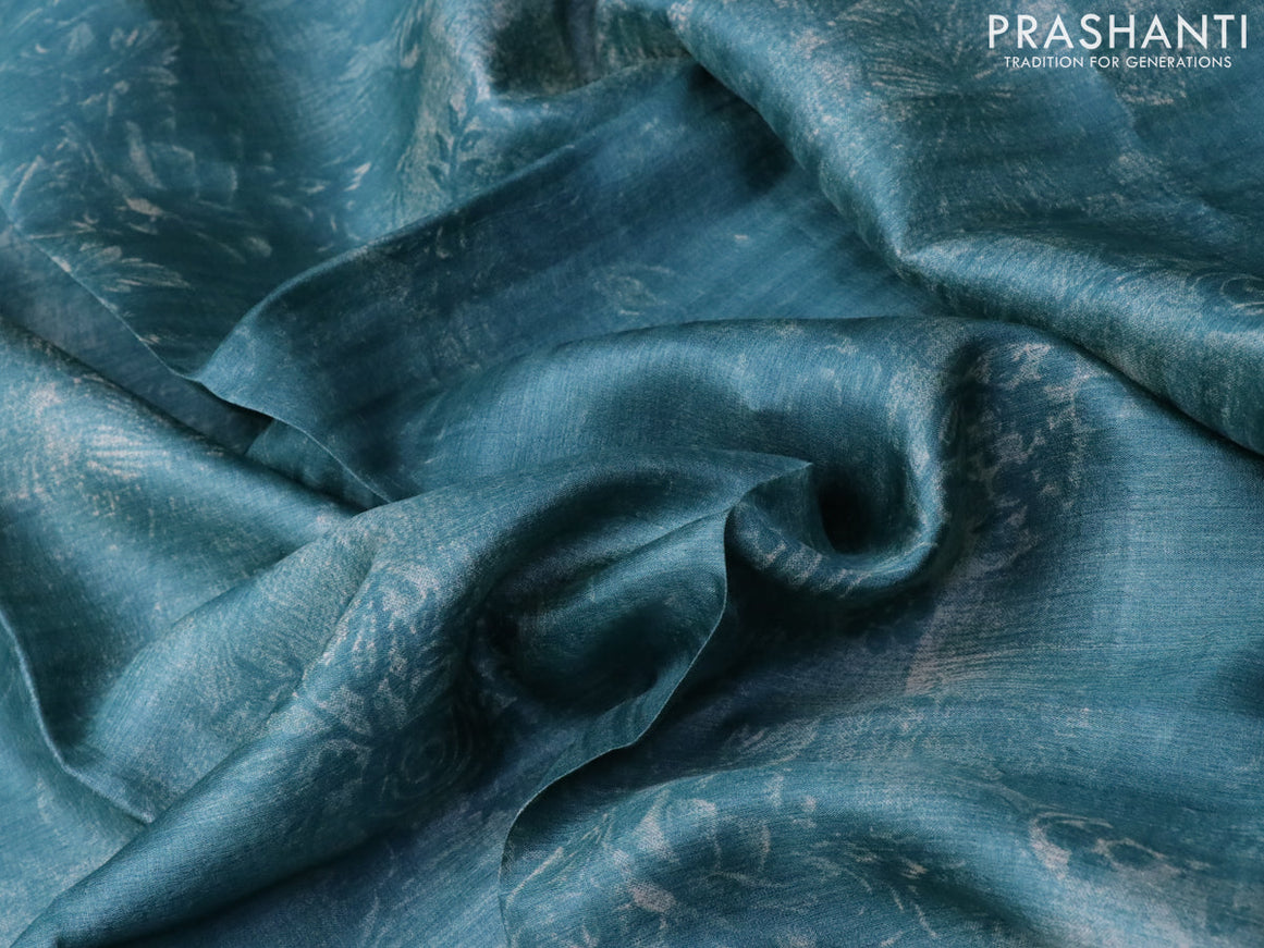 Pure tussar silk saree teal blue shade with floral prints in borderless style