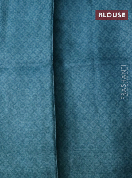 Pure tussar silk saree teal blue shade with floral prints in borderless style