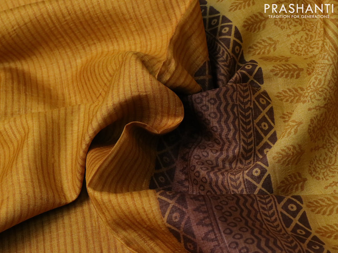 Pure tussar silk saree mustard yellow and sandal brown with allover stripe prints and paisley printed border