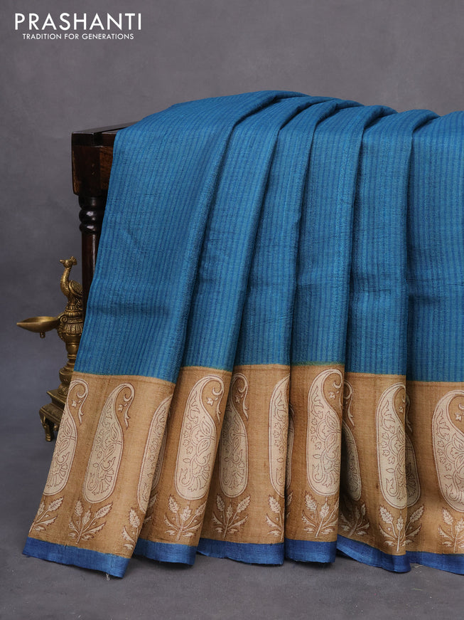 Pure tussar silk saree cs blue and sandal dark blue with allover stripe prints and paisley printed border