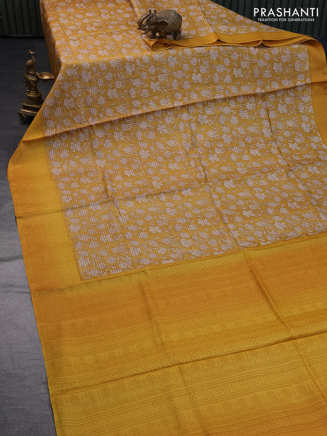 Pure tussar silk saree mustard yellow with allover floral prints and printed border