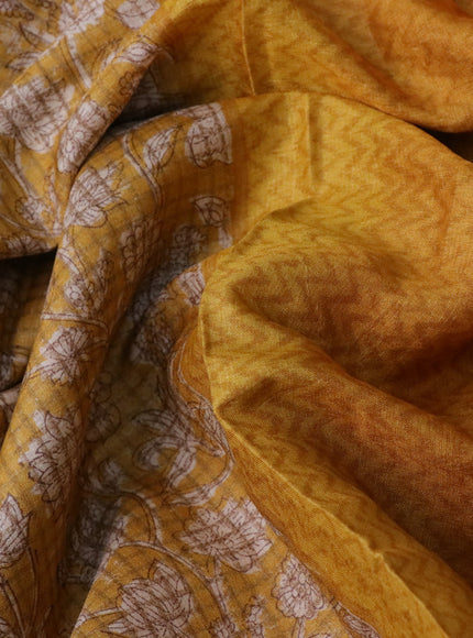 Pure tussar silk saree mustard yellow with allover floral prints and printed border