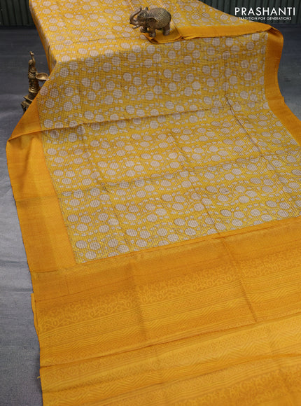 Pure tussar silk saree yellow and mustard yellow with allover floral prints and printed border