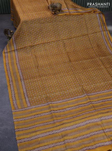 Pure tussar silk saree yellow and pastel brown with allover checked pattern & butta prints and printed border