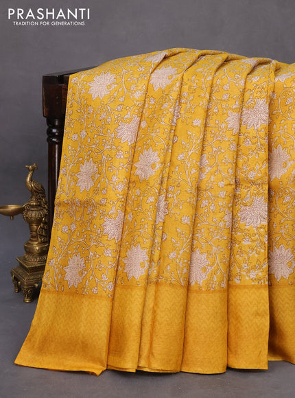 Pure tussar silk saree yellow with allover floral prints and printed border