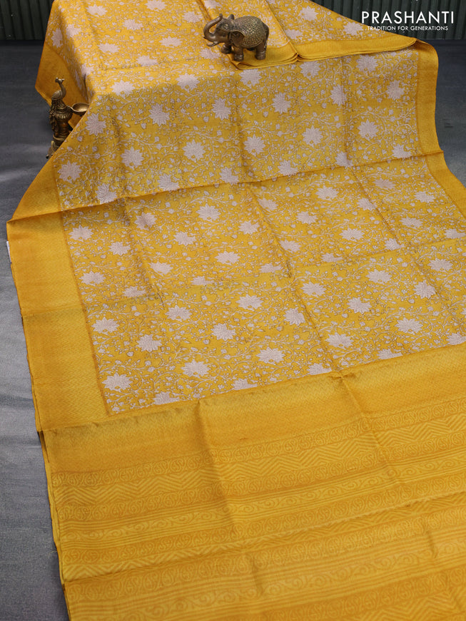 Pure tussar silk saree yellow with allover floral prints and printed border