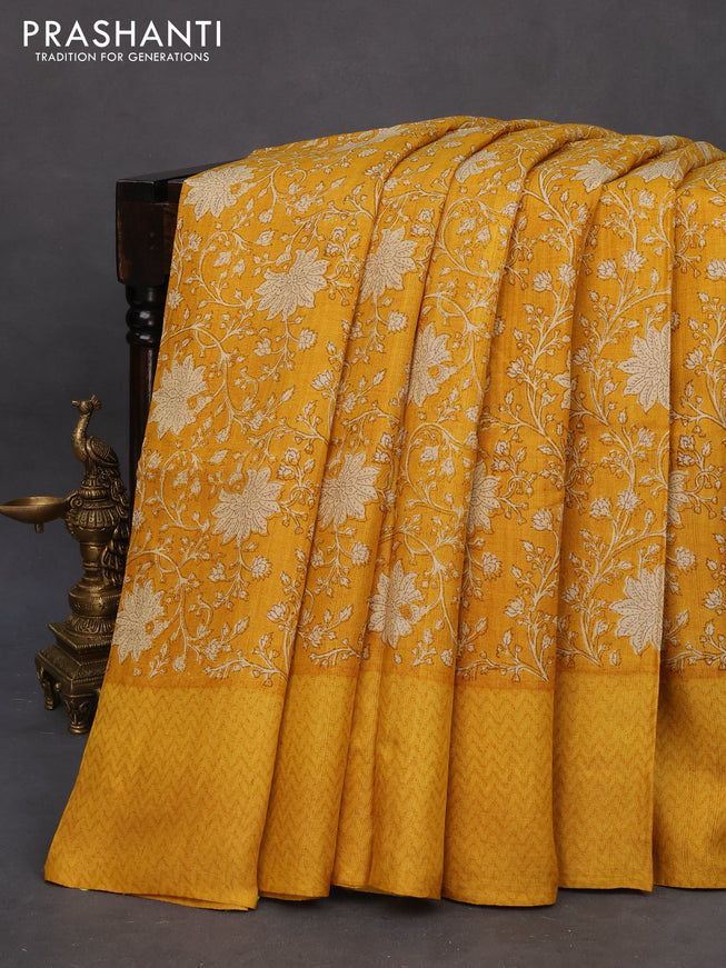 Pure tussar silk saree mustard yellow with allover floral prints and printed border