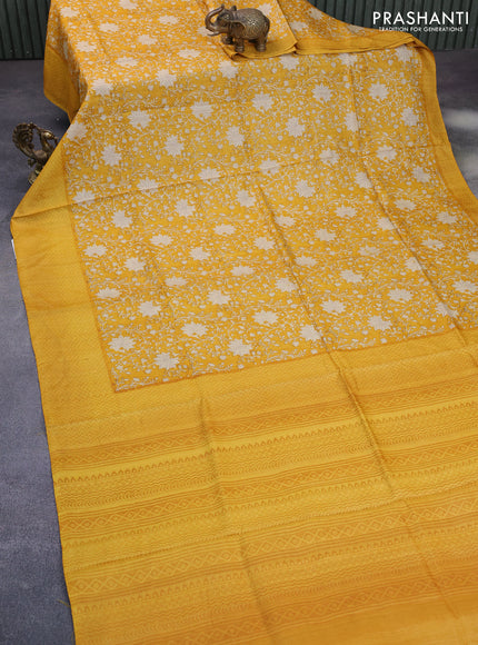 Pure tussar silk saree mustard yellow with allover floral prints and printed border