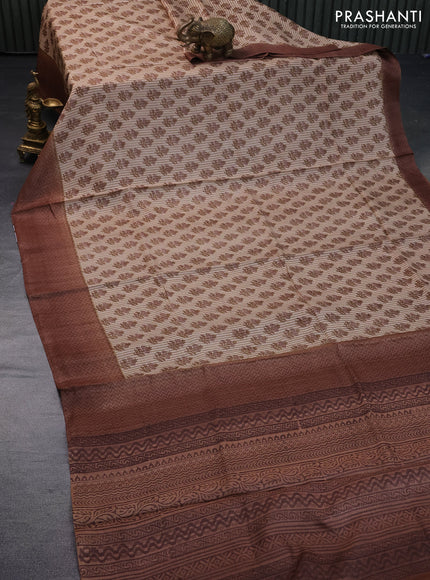 Pure tussar silk saree beige and brown with allover floral butta prints and printed border