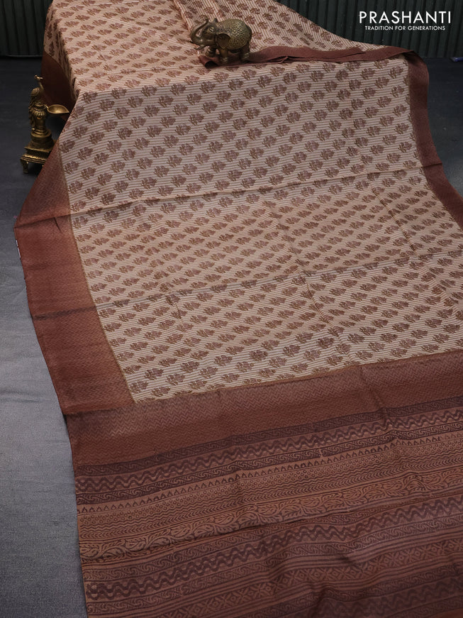 Pure tussar silk saree beige and brown with allover floral butta prints and printed border