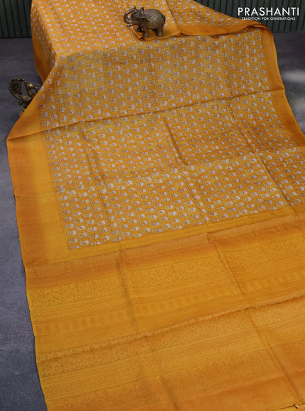 Pure tussar silk saree yellow with allover floral butta prints and printed border