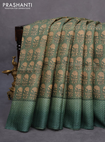 Pure tussar silk saree sap green shade with allover floral butta prints and printed border