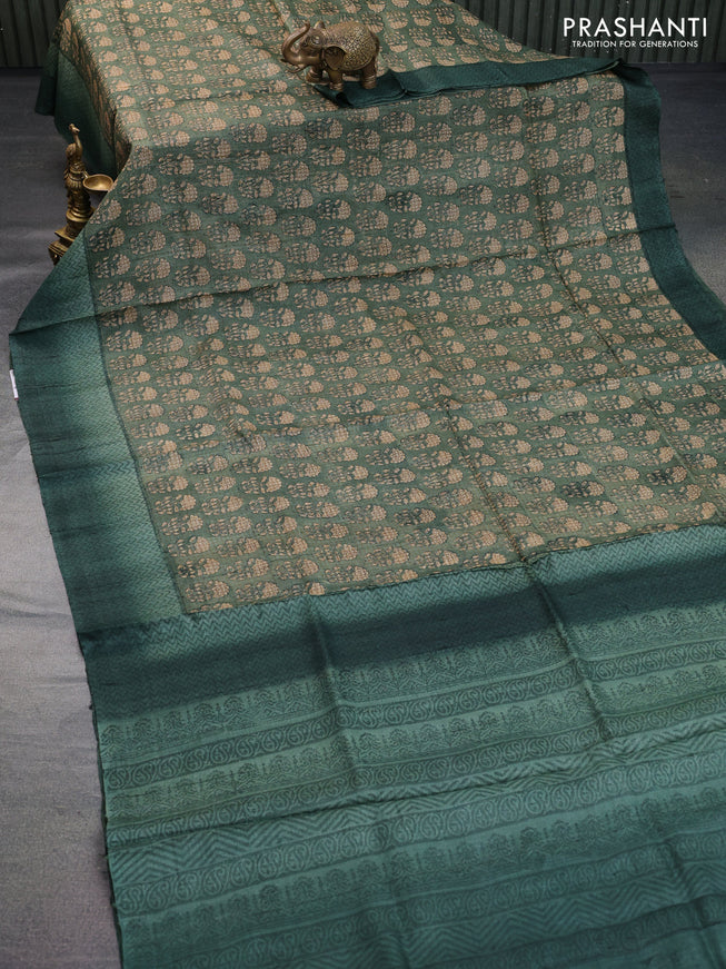 Pure tussar silk saree sap green shade with allover floral butta prints and printed border