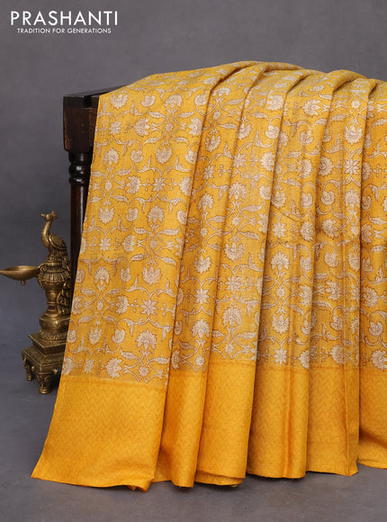 Pure tussar silk saree mustard yellow with allover floral prints and printed border