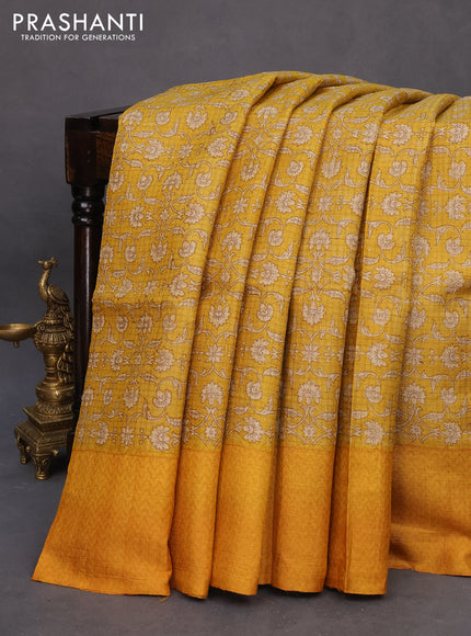 Pure tussar silk saree mustard yellow with allover floral prints and printed border