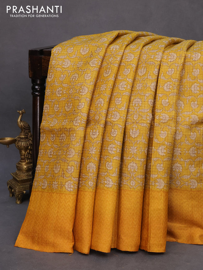 Pure tussar silk saree mustard yellow with allover floral prints and printed border