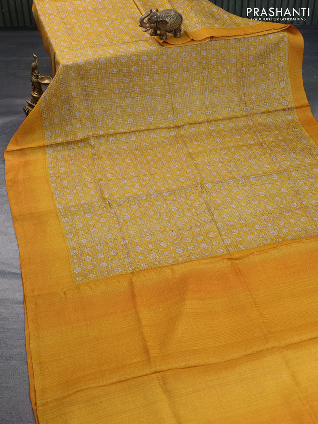 Pure tussar silk saree mustard yellow with allover floral prints and printed border