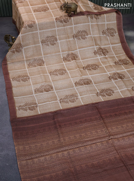 Pure tussar silk saree sandal and brown with allover prints and simple border