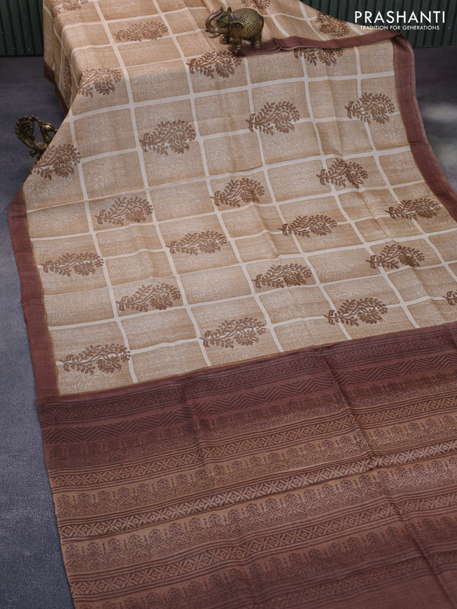 Pure tussar silk saree sandal and brown with allover prints and simple border