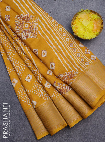 Semi dola saree mustard yellow with allover bandhani prints and zari woven border