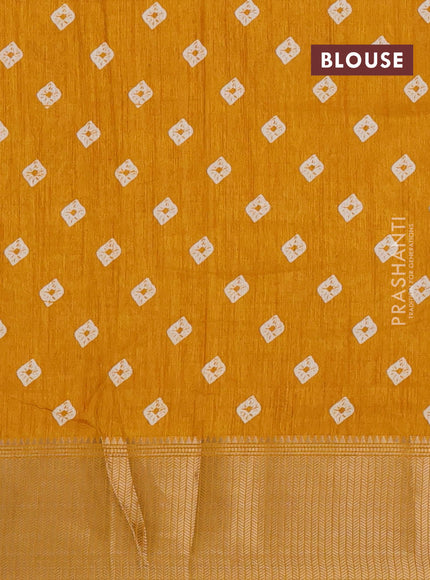 Semi dola saree mustard yellow with allover bandhani prints and zari woven border