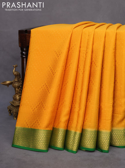 Pure mysore silk saree mustard yellow and green with allover self emboss and zari woven border