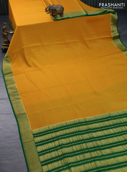 Pure mysore silk saree mustard yellow and green with allover self emboss and zari woven border