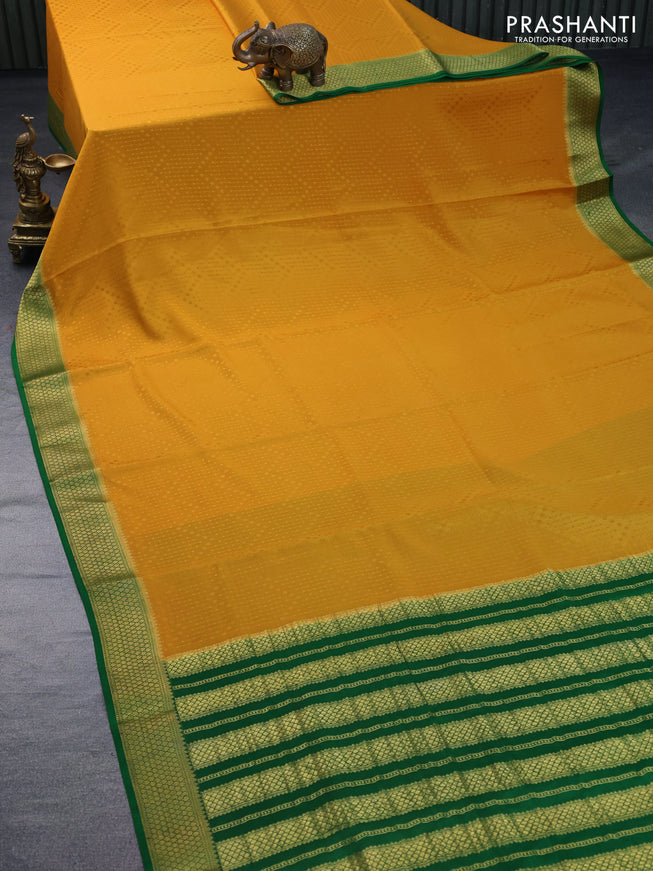 Pure mysore silk saree mustard yellow and green with allover self emboss and zari woven border