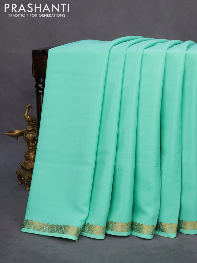 Pure mysore silk saree teal green shade with plain body and zari woven border