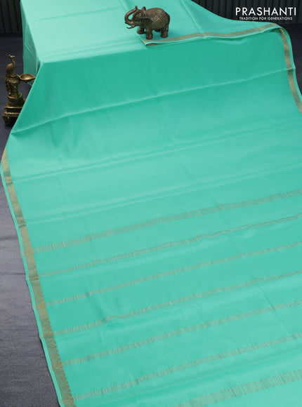 Pure mysore silk saree teal green shade with plain body and zari woven border