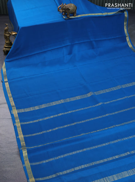 Pure mysore silk saree peacock blue with plain body and zari woven border