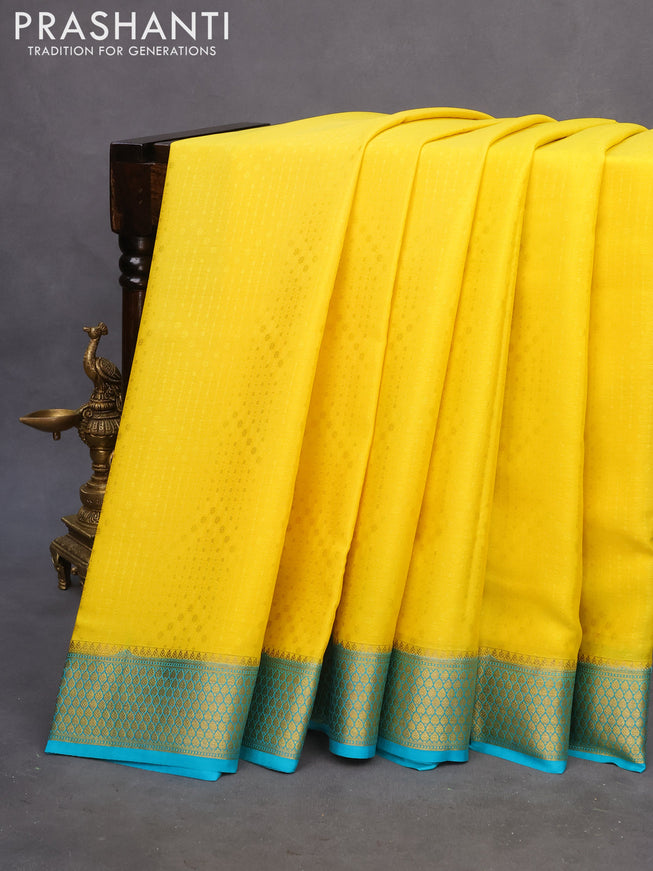 Pure mysore silk saree yellow and teal blue with allover self emboss and zari woven border