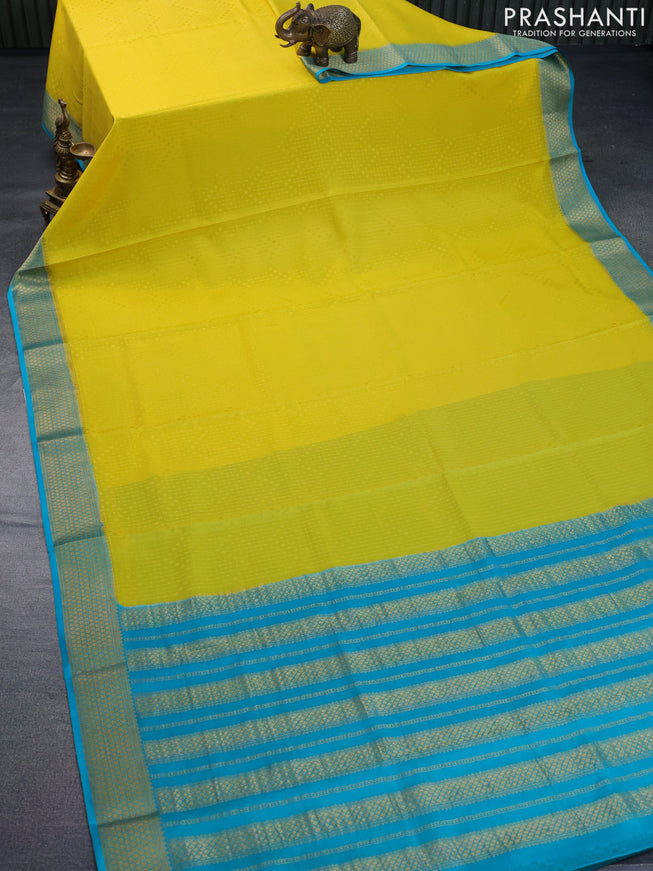 Pure mysore silk saree yellow and teal blue with allover self emboss and zari woven border