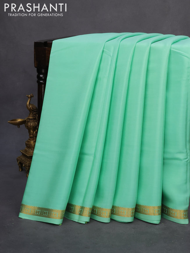 Pure mysore silk saree teal green shade with plain body and zari woven border