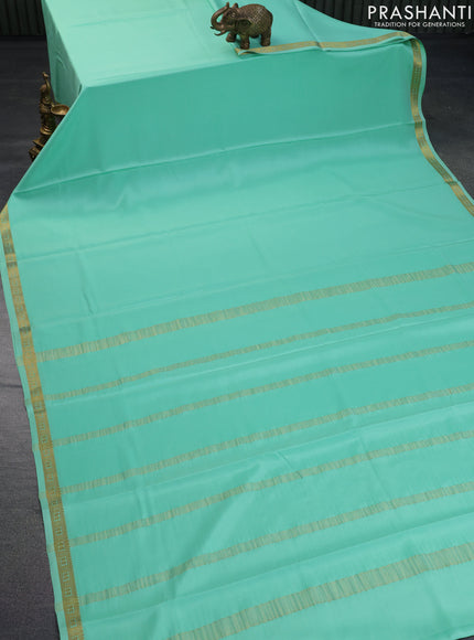 Pure mysore silk saree teal green shade with plain body and zari woven border