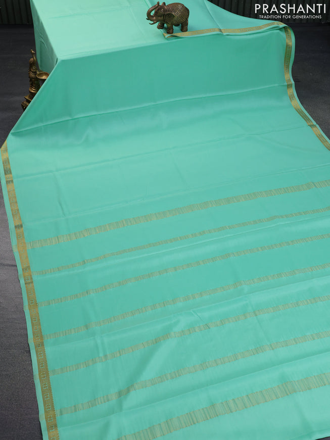 Pure mysore silk saree teal green shade with plain body and zari woven border