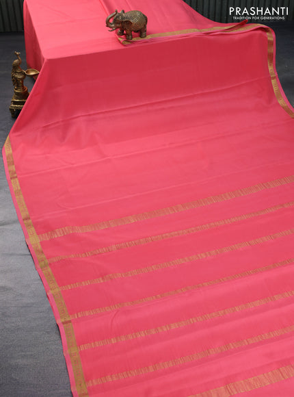 Pure mysore silk saree peach pink with plain body and zari woven border